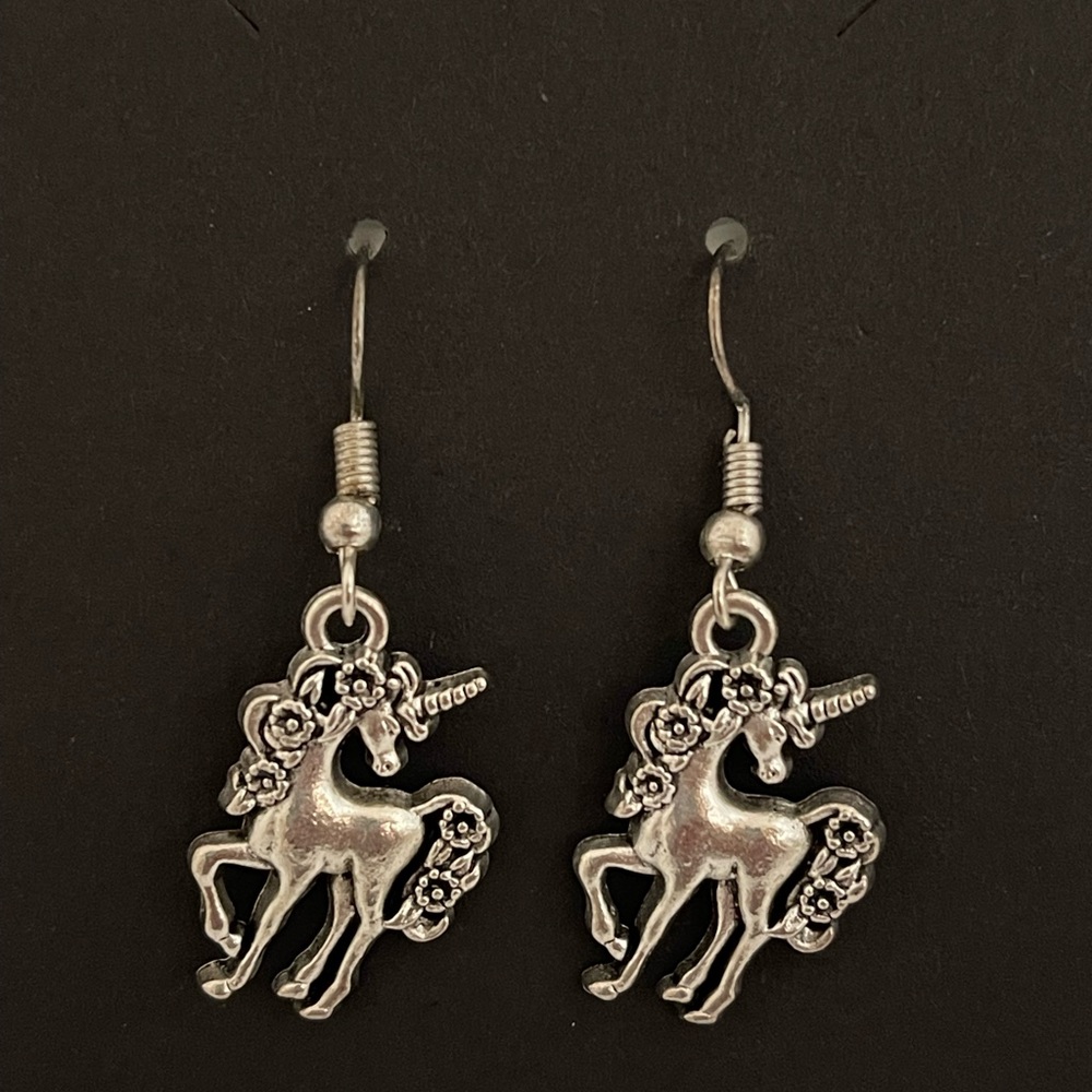 Hand crafted drop dangle unicorn earrings.  Very cute.